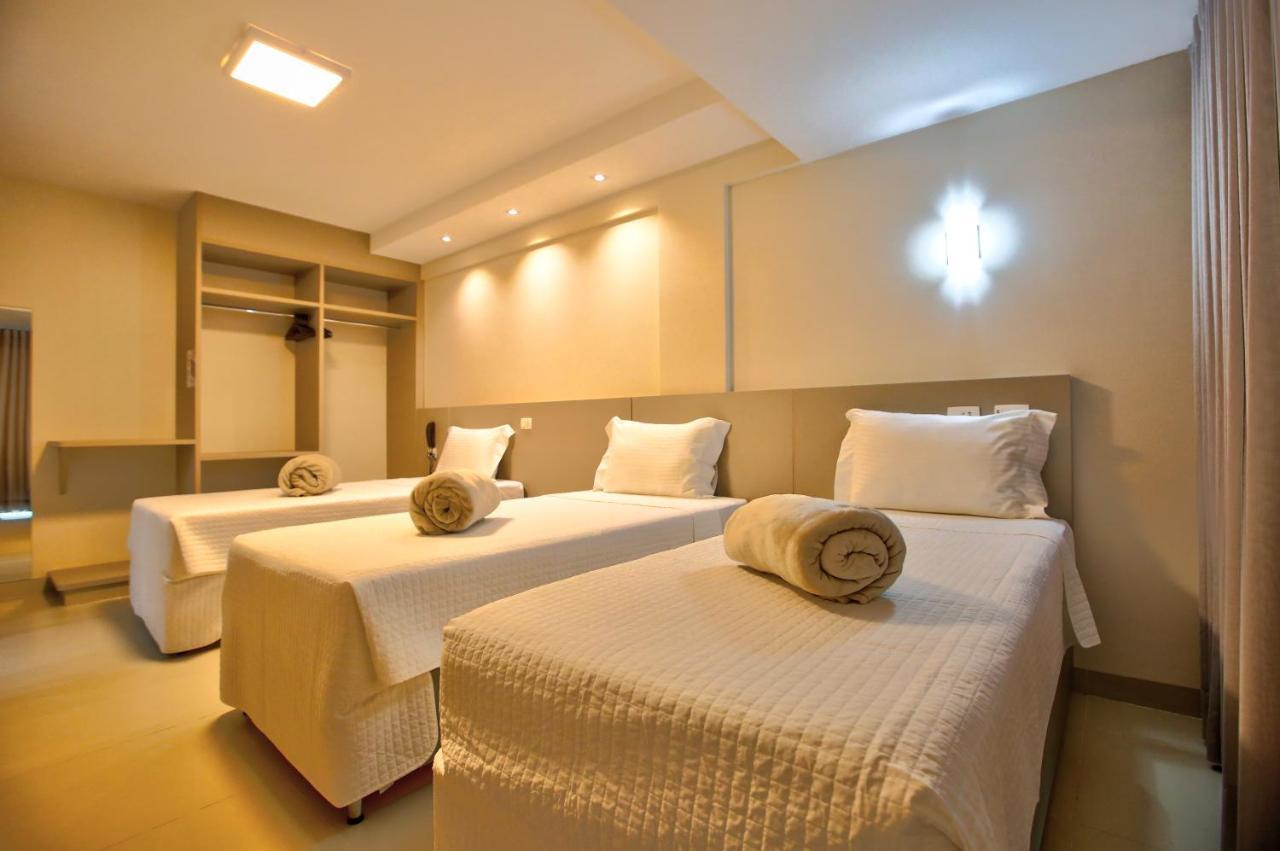 Quarto Triplo Executivo